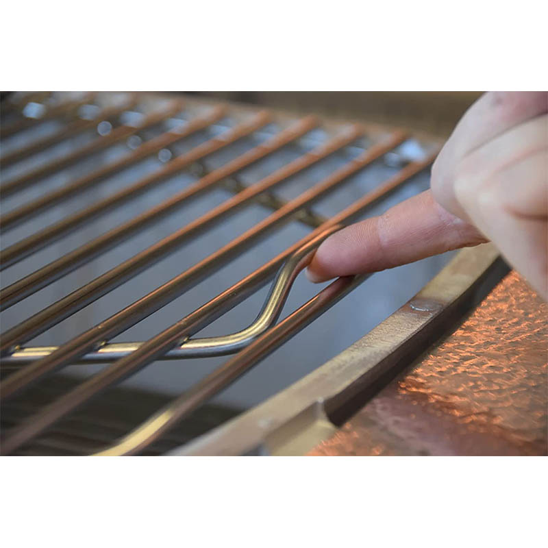 hinged cooking grid replaces the stock nickel-steel grill grate